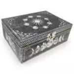 5 by 7 inch wood box with a hand-carved metal moon phase design, velvet lined with a secure latch