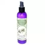 Purple 8 oz Envision Crystal White Sage Spray bottle with black pump top, showing an illustration of tied white sage smudge bundles against a green vine pattern label.