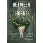 Between the Horns by Elwynn Green paperback book cover, a 224-page 6 x 9 inch witchcraft guide published by Weiser Books.