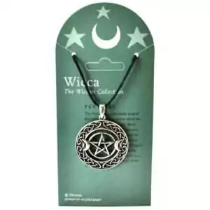 Silver-tone pewter pentacle pendant showing a five-pointed star flanked by two crescent moons at top, ringed by an interlocking Celtic knotwork border, on a black cord, shown on a Wicca Wiccan Collection display card.
