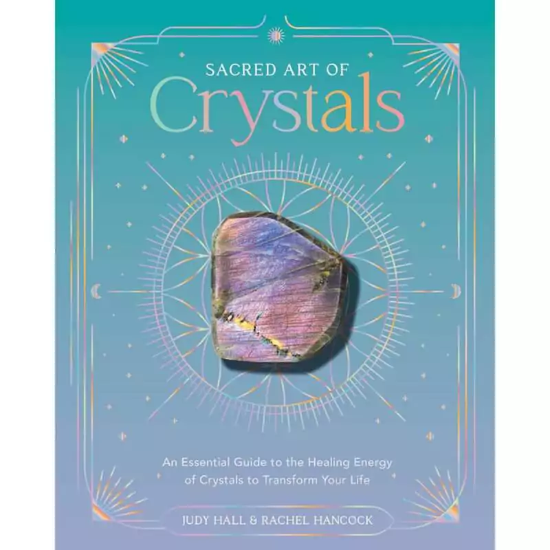 Sacred-Art-of-Crystals-hc-by-Hall-Hancock-BSACARTC Hardcover Sacred Art of Crystals by Judy Hall and Rachel Hancock open to a crystal grid layout page
