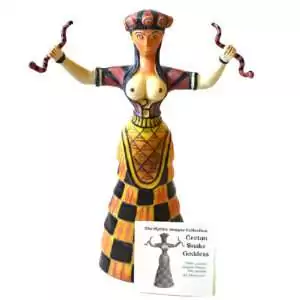 Cretan Snake Goddess statue: a painted figure with raised arms and a snake in each hand, a banded crown, and a black and yellow checked skirt, with a small card reading Cretan Snake Goddess.