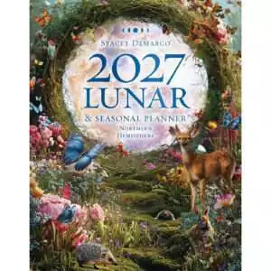 Cover of the 2027 Lunar and Seasonal Planner by Stacey Demarco, Northern Hemisphere: a pale Moon in a vine wreath above a flower meadow with butterflies, a fawn, a rabbit and a hedgehog.