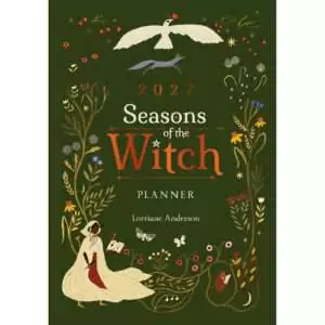 Green cover of the 2027 Seasons of the Witch Planner by Lorriane Anderson, with a hooded woman holding an open book, a white bird, a fox, moths and wildflowers around the title.