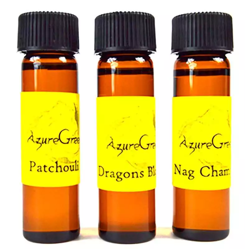 2dr-Hyssop-oil-azuregreen-OA2HYS Three amber glass AzureGreen 2 dram vials of ritual aroma oil with black ribbed caps and yellow labels