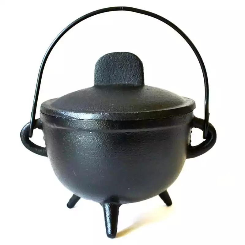 4-12quot-Cast-iron-cauldron-w-lid-ICBR90 Black cast iron cauldron with a fitted lid, arched wire handle, two side loops, and three short legs, with a plain surface and no emblem, photographed on white