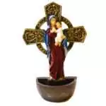 Madonna and Child holy water font: Mary in a blue mantle and red gown holding the infant Jesus before a gold-toned ringed cross, above an aged-copper half-round basin.