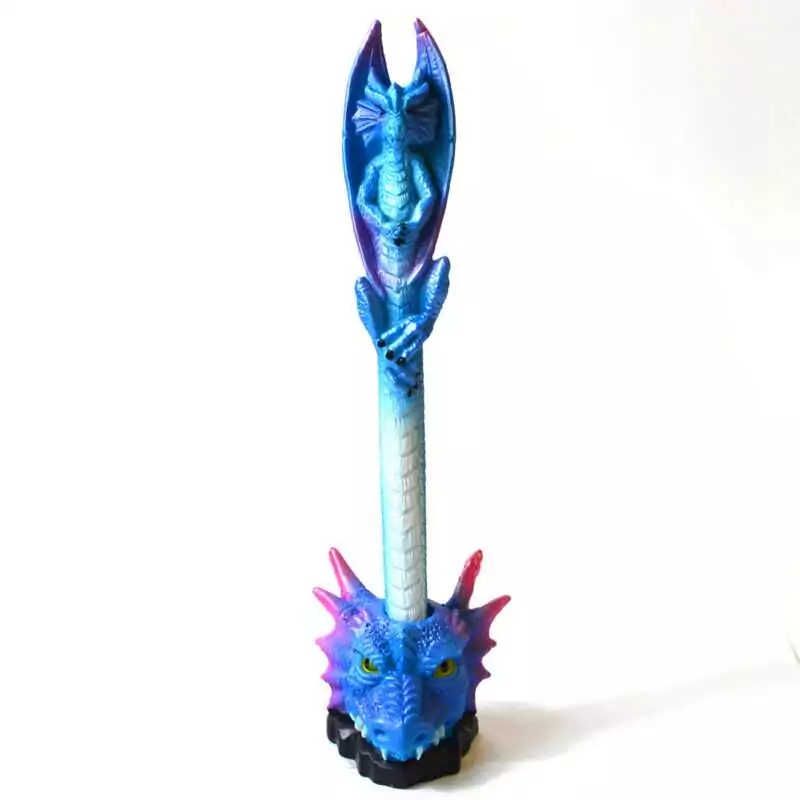 7quot-Blue-Dragon-pen-FP3536 Blue dragon pen standing in a royal blue dragon-head holder with magenta horns, a cobalt winged dragon with violet wings on top, and a pale blue barrel, on white