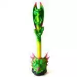 Green dragon pen standing in a green dragon-head holder with pink horns and blue eyes, a winged dragon on top, and a green to yellow scaled barrel, on white