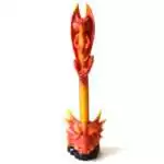 Red dragon pen standing in a dragon-head holder on a black rock base, with a winged dragon seated on top and an orange and gold scaled barrel, on white