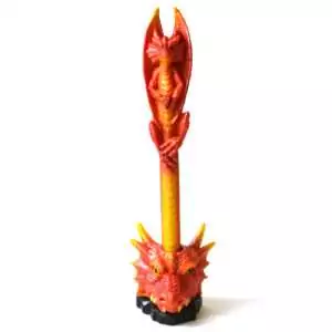Red dragon pen standing in a dragon-head holder on a black rock base, with a winged dragon seated on top and an orange and gold scaled barrel, on white