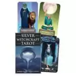 Silver Witchcraft Tarot box by Barbara Moore and Franco Rivolli with a silver bowl pouring water at dusk, beside The Magician, The High Priestess and a robed figure with a lion