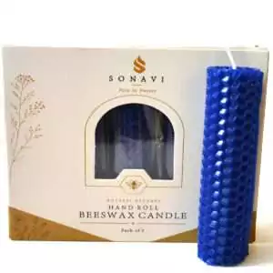 Blue hand-rolled honeycomb beeswax candle with a tall white wick, standing in front of its cream and kraft box marked Natural Beeswax Hand Roll Beeswax Candle, Pack of 5