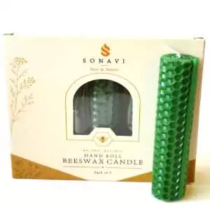 Green hand-rolled beeswax candle with a honeycomb surface and a visible seam down one side, standing in front of its cream box marked Natural Beeswax Hand Roll Beeswax Candle, Pack of 5