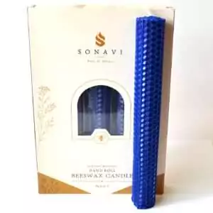 Royal blue 8 inch hand-rolled honeycomb beeswax candle with a white wick standing in front of its cream box marked Natural Beeswax Hand Roll Beeswax Candle, Pack of 5
