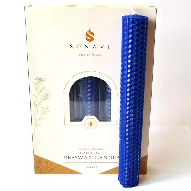 set-of-5-8quot-Blue-beeswax-candles-CSB8BL Royal blue 8 inch hand-rolled honeycomb beeswax candle with a white wick standing in front of its cream box marked Natural Beeswax Hand Roll Beeswax Candle, Pack of 5