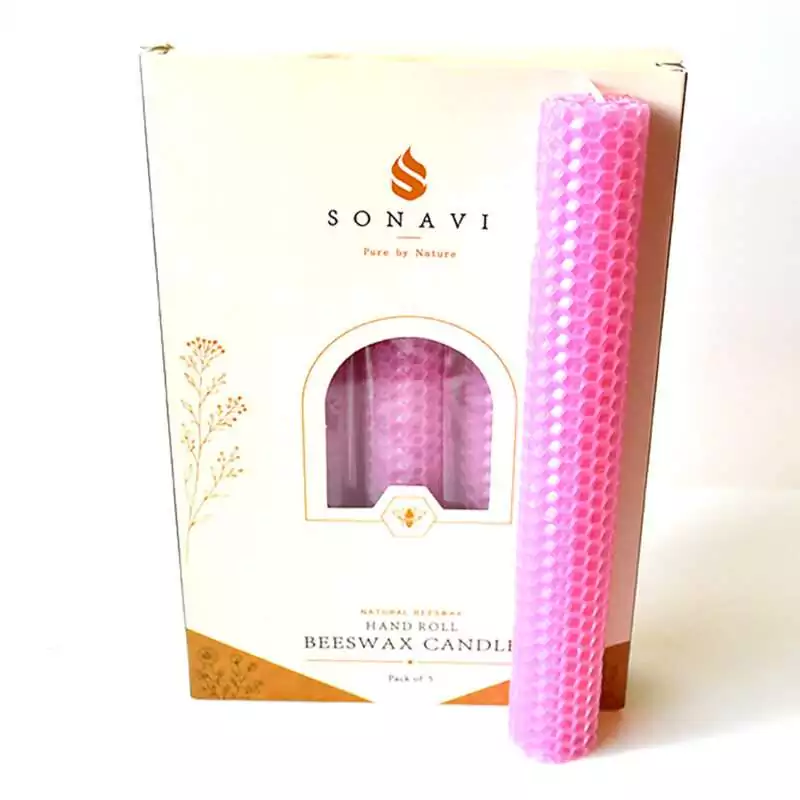 set-of-5-8quot-Pink-beeswax-candles-CSB8PI Soft pink 8 inch hand-rolled honeycomb beeswax candle with a white wick standing in front of its cream box marked Natural Beeswax Hand Roll Beeswax Candle, Pack of 5