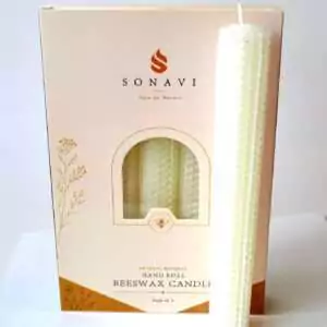 Cream-white 8 inch hand-rolled honeycomb beeswax candle with a white wick standing in front of its cream box marked Natural Beeswax Hand Roll Beeswax Candle, Pack of 5