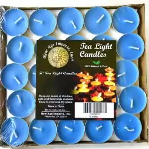 Square tray of 50 mid-blue tea light candles under clear wrap, each in a small metal cup with a white wick, with a pack label reading Tea Light Candles and 50 Tea Light Candles