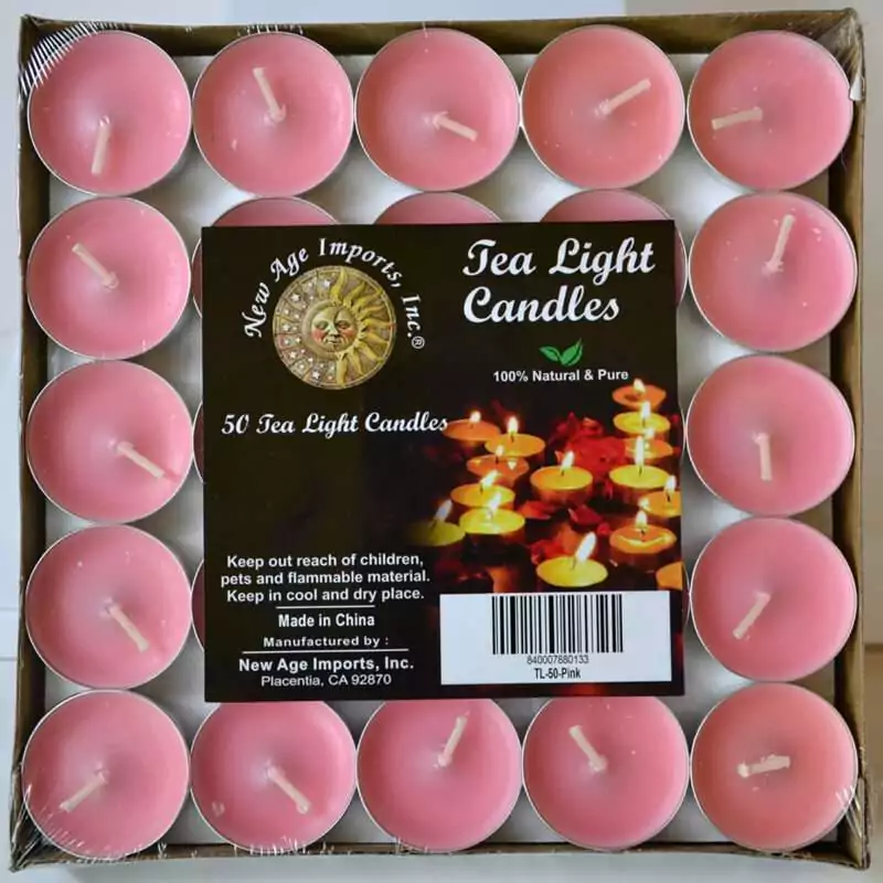 set-of-50-2-hour-Pink-Tea-Light-CV2PI Square tray of 50 soft rose-pink tea light candles under clear wrap, each in a small metal cup with a pale wick, with a pack label reading Tea Light Candles and 50 Tea Light Candles