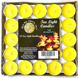 Square tray of 50 bright yellow tea light candles under clear wrap, each in a small metal cup with a pale wick, with a pack label reading Tea Light Candles and 50 Tea Light Candles
