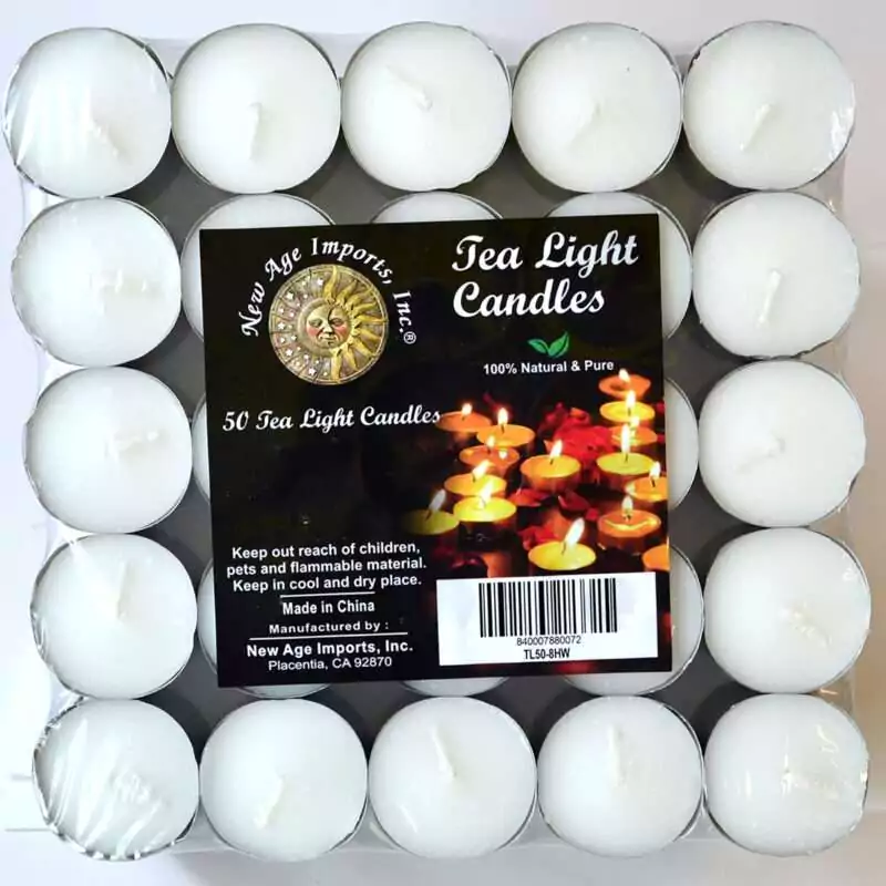 Square pack of 50 white candles in metal cups under clear film, each with a short white wick, with a pack label reading Tea Light Candles and 50 Tea Light Candles