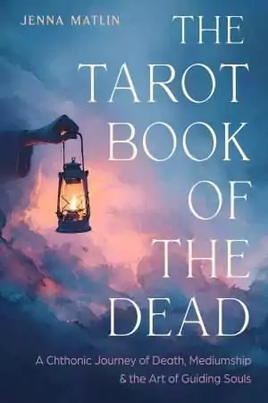 Cover of The Tarot Book of the Dead by Jenna Matlin, showing a hand holding a lit lantern against blue and pink watercolor-style clouds, with the subtitle about death, mediumship and guiding souls